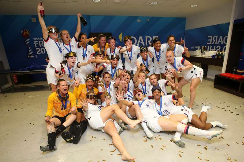 The USA players celebrate with the FIFA Women's World Cup Trophy following their championship victory over the Netherlands in France, on July 07, 2019.