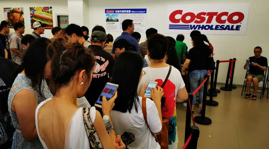 People lined up to get Costco membership cards days before the first Costco store opened in China, in the suburbs outside Shanghai.