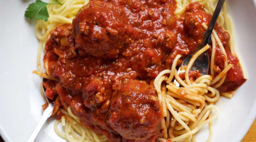 Spaghetti with traditional meat sauce and meatballs at Olive Garden.