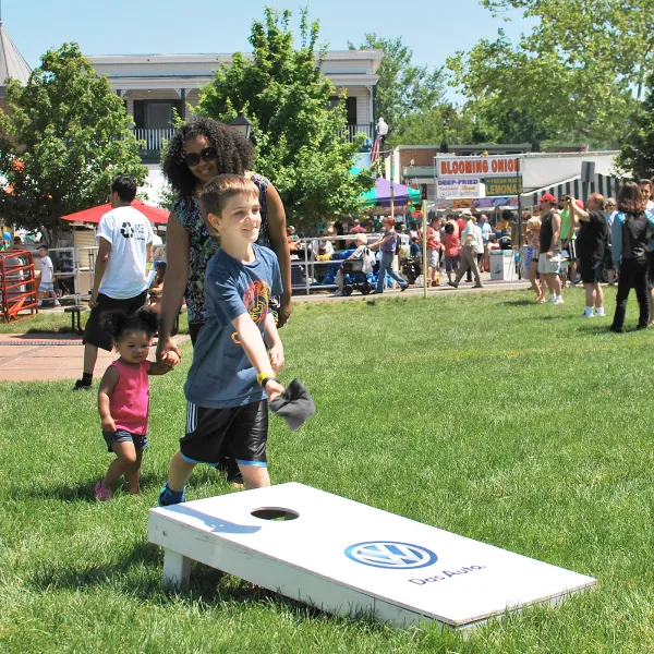 BPL19-Dranesville-Virginia-14 child playing cornhole in Dranesville, Virginia