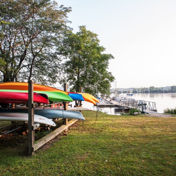 Kayaks stored by a lake in Eagle Creek, Indianapolis, Indiana