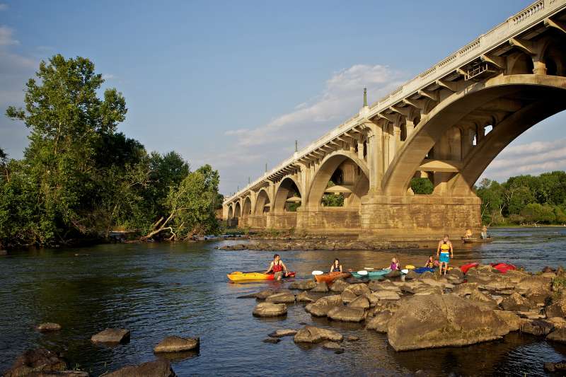 Kayakers under a bridge in Columbia, South Carolina