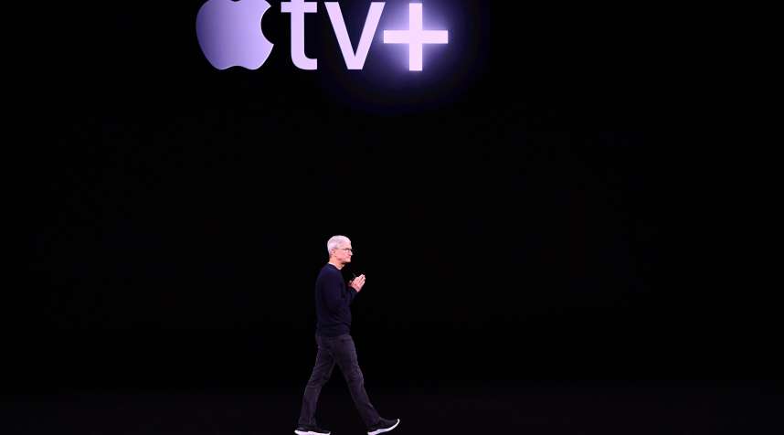 Apple CEO Tim Cook speaks on-stage during a product launch event at Apple's headquarters in Cupertino, California on September 10, 2019.