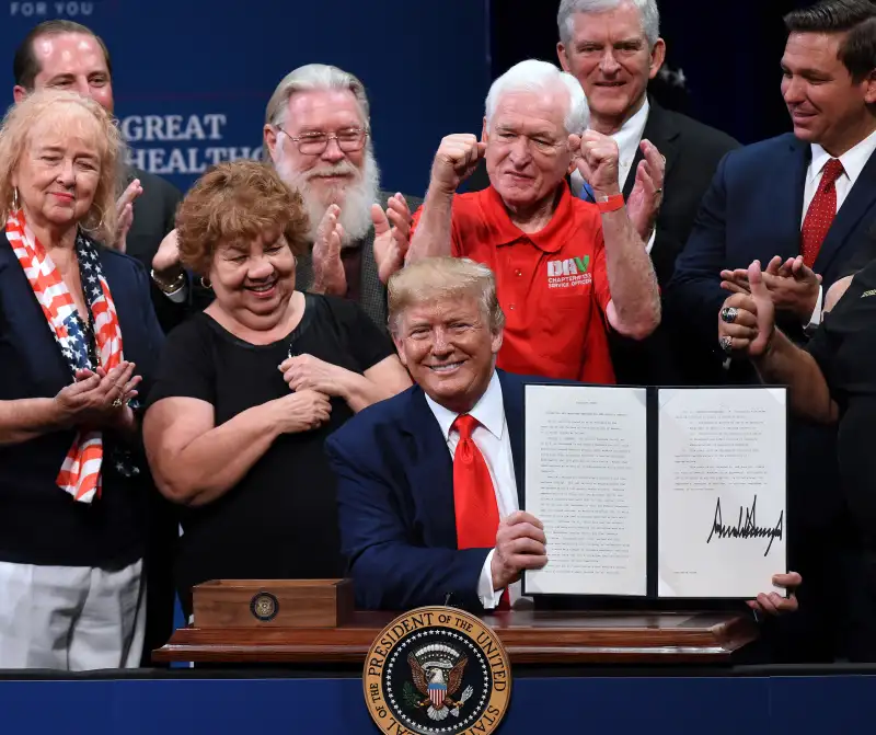 THE VILLAGES, FLORIDA, UNITED STATES - 2019/10/03: U.S. President Donald Trump signs an executive order to protect and improve Medicare at the Sharon L. Morse Performing Arts Center.