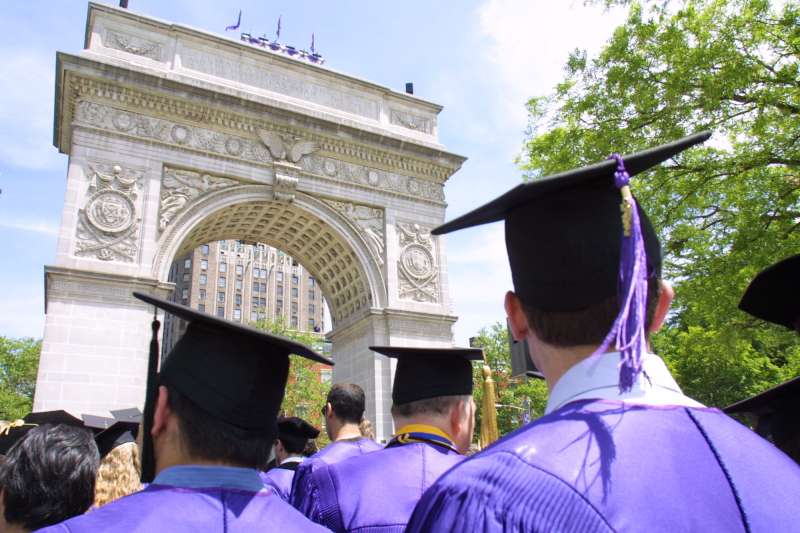 Photo by Tina Fineberg/AP/Shutterstock; a graduation ceremony at NYU