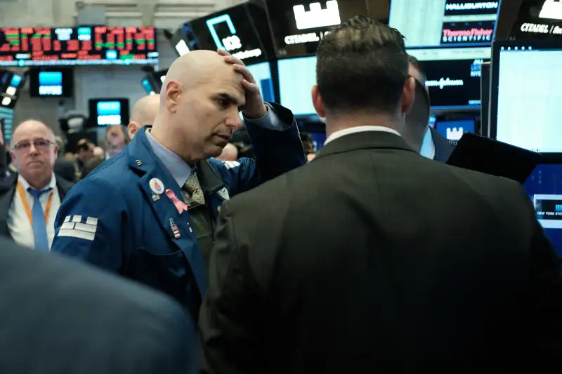 Dow closes out its worst day in three months, falls more than 700