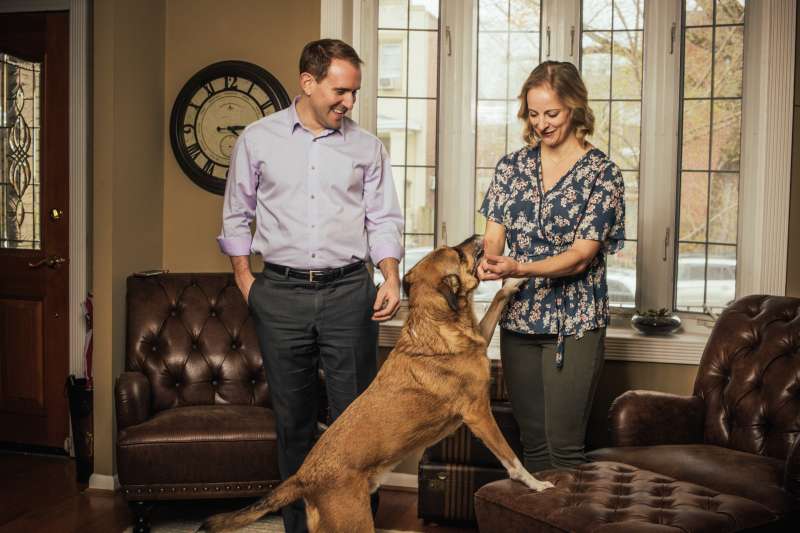 Chris and Danielle Betz with their dog Mazi at their home in Washington, DC on March 6, 2020.