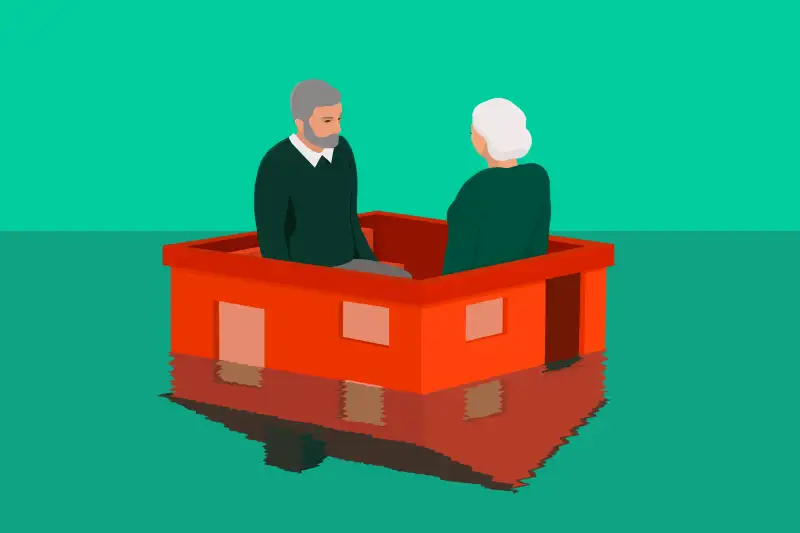 two older adults sitting on a house that is going underwater what is a reverse mortgage