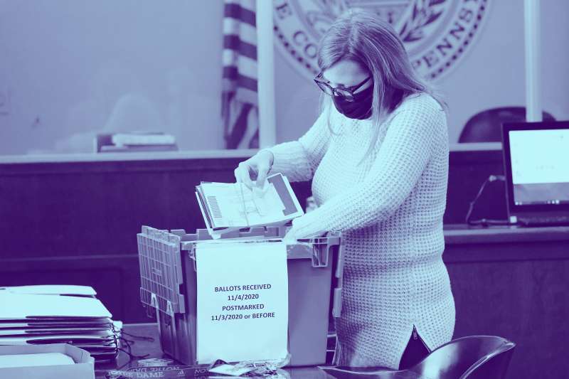 Luzerne County worker canvases ballots that arrived after closing of voting until Friday at 5pm and postmarked by Nov. 3rd as vote counting in the general election continues, in Wilkes-Barre, Pa
              Election 2020 Pennsylvania Vote Counting, Wilkes-Barre, United States - 06 Nov 2020