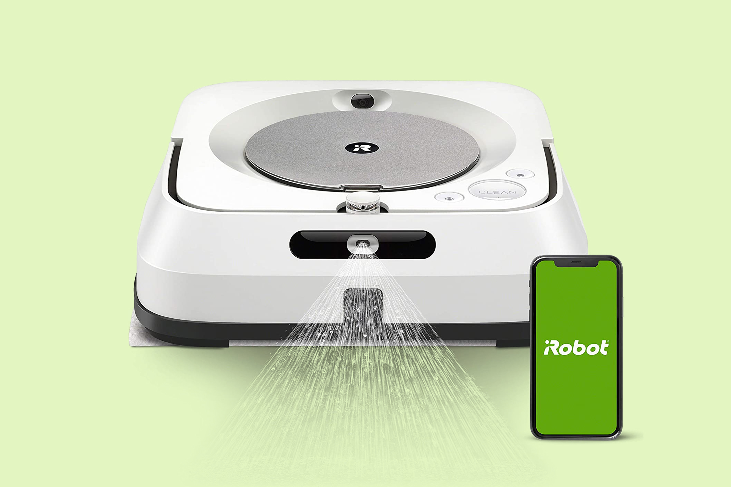 White iRobot Braava Jet M6 with Black Accents Spraying Cleaner Towards Camera