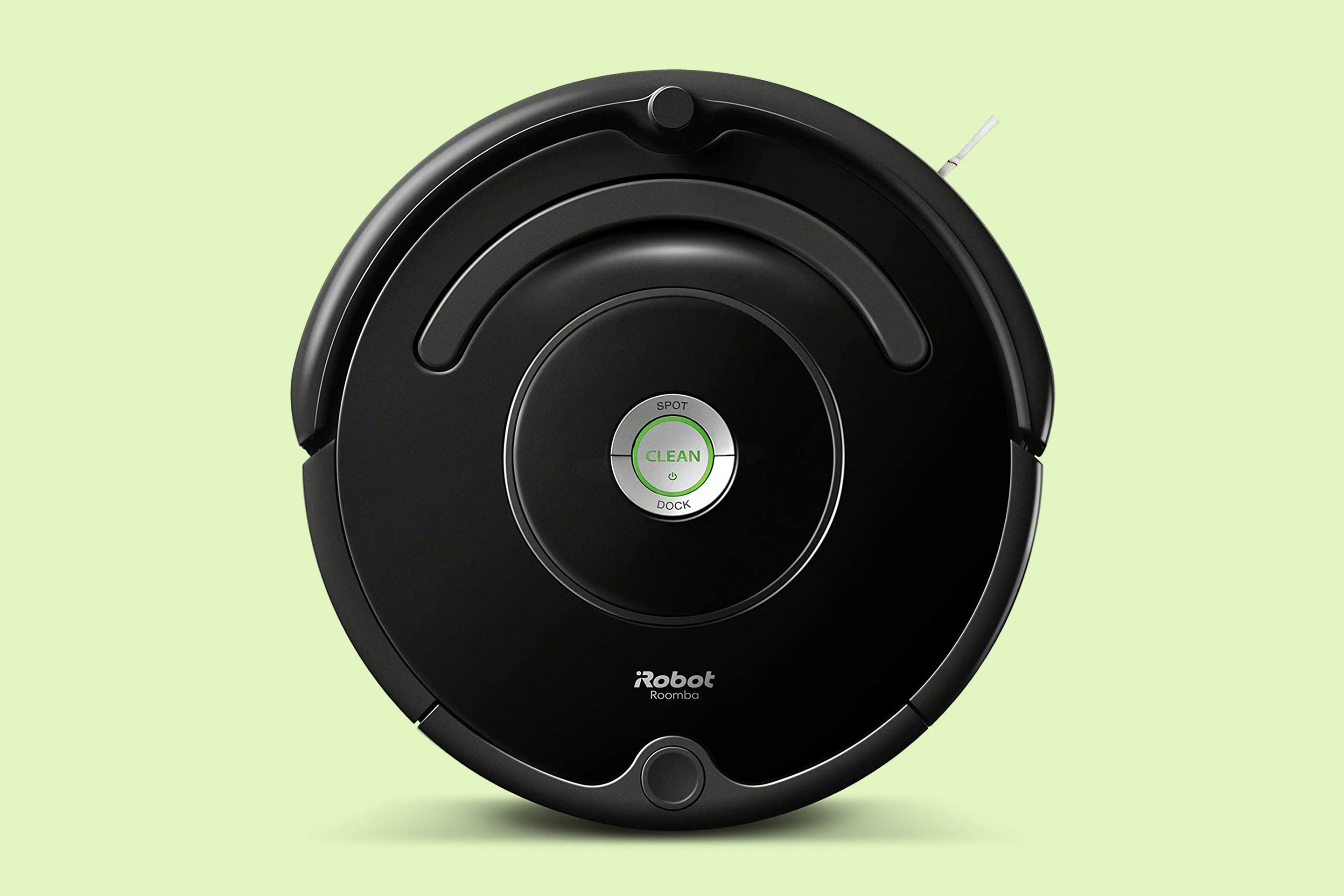 Black iRobot Roomba 614 against Green Background