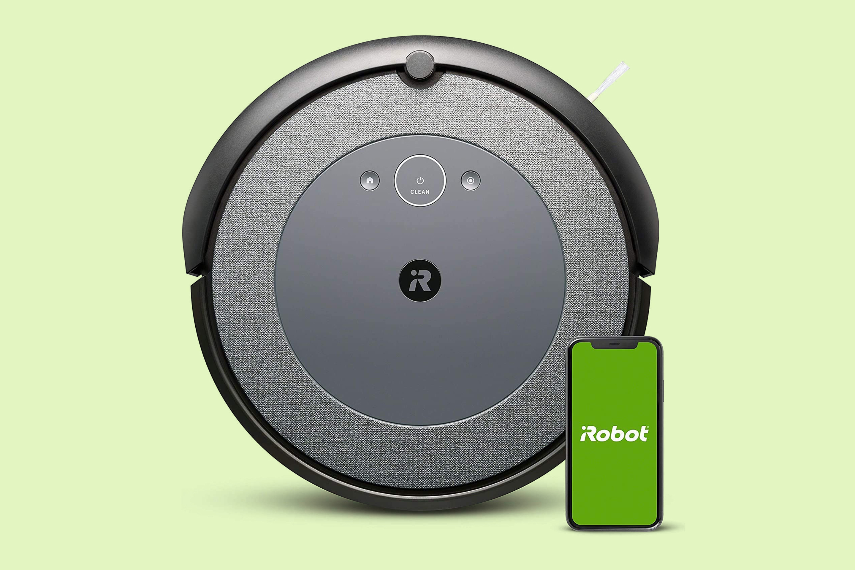 Black and Gray iRobot Roomba i3 with smartphone