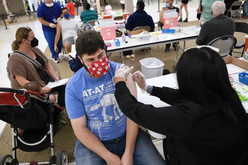 Young man getting vaccinated against Covid-19