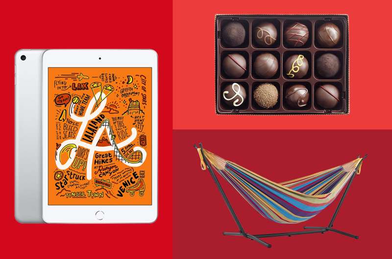 An ipad, a Hammock and a box of chocolate on a colored background