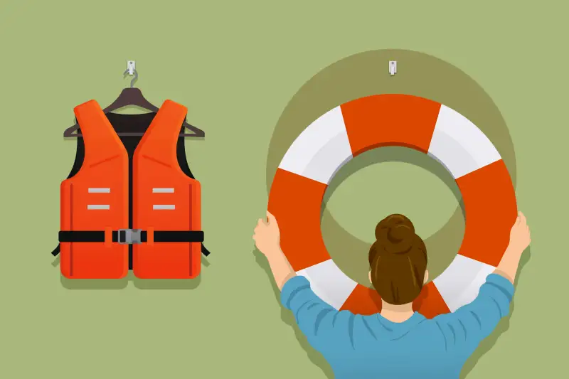 A person is choosing the life preserver, next to the life vest.