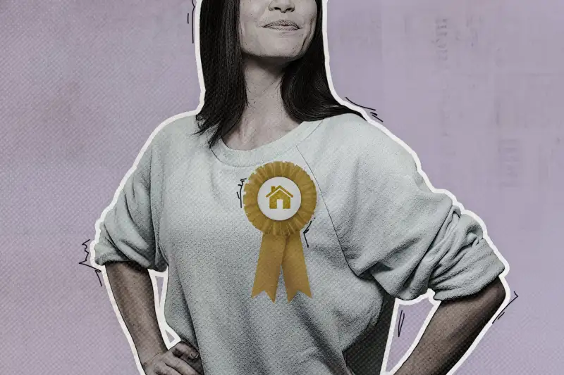 Woman With Winner Ribbon Containing A House Silhouette On Shirt