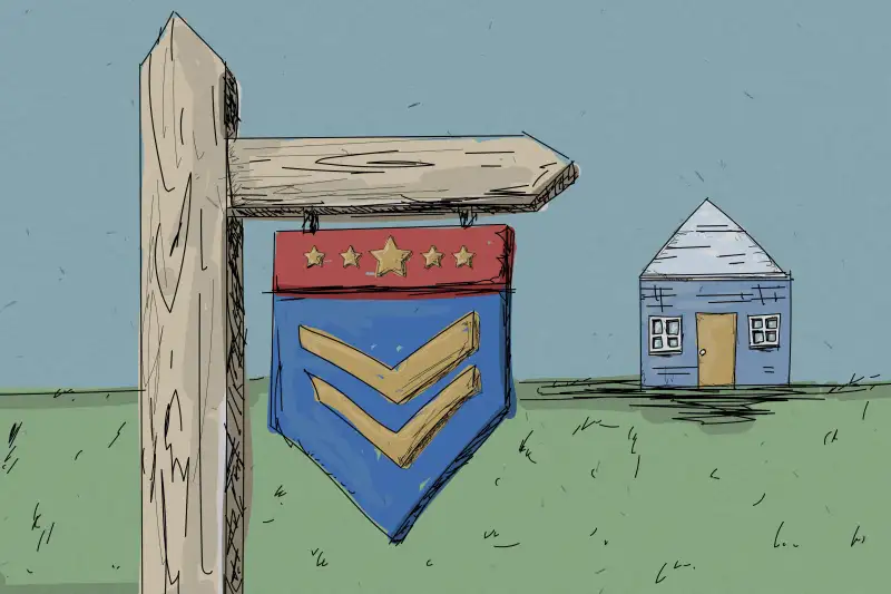 Sold Sign With Military Badge In Front Of A House