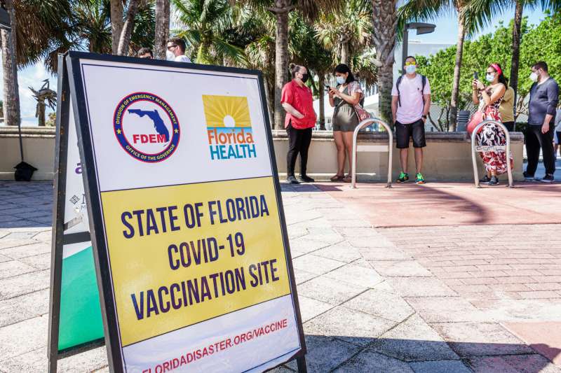 People waiting in line at a Miami Beach, Covid-19 vaccination site