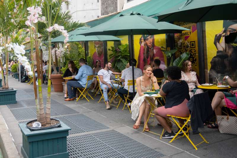 People Dining At Outdoor Restaurant