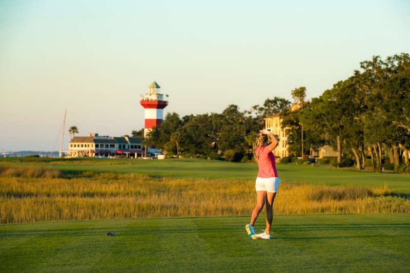 A young woman plays golf at Hilton Head Island South Carolina