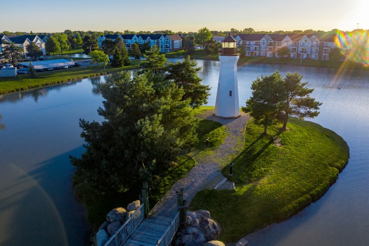 Aerial photo of a lighthouse on a manmade island in Macomb Michigan