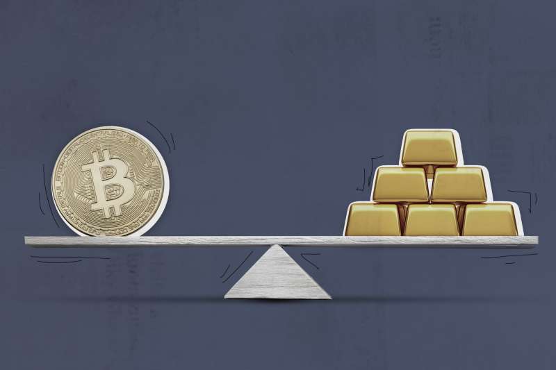 Bitcoin And Gold Bars On Balance Scale