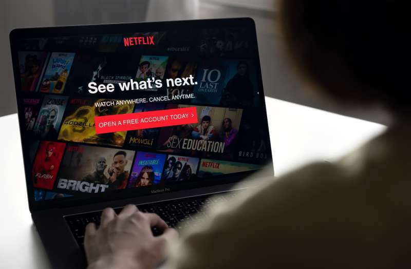 Closeup of a person opening a new Netflix account on a computer screen
