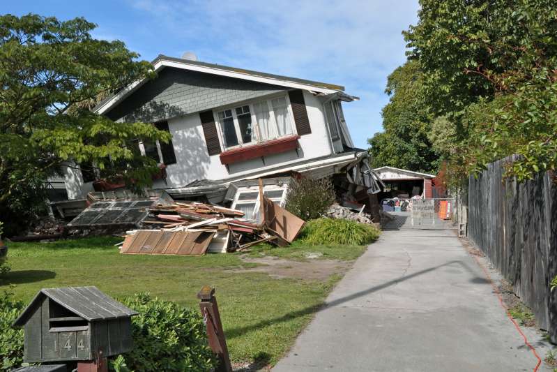 Collapsed house damaged by earthquake