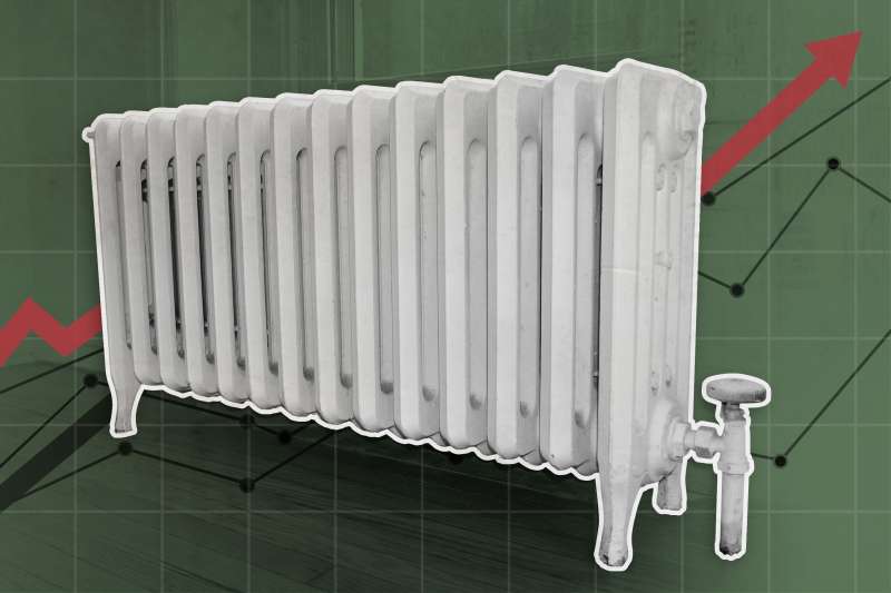 An Apartment Heater With A Red Arrow Graphic Pointing Upwards