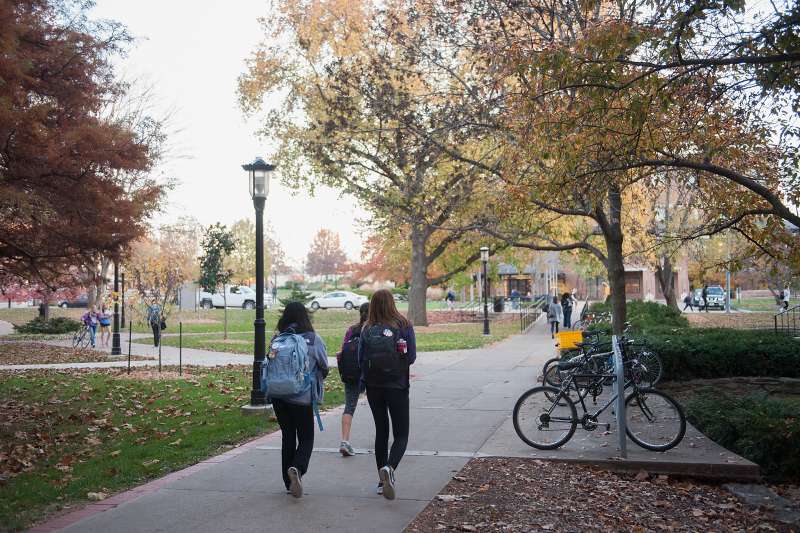 Students walk along University campus