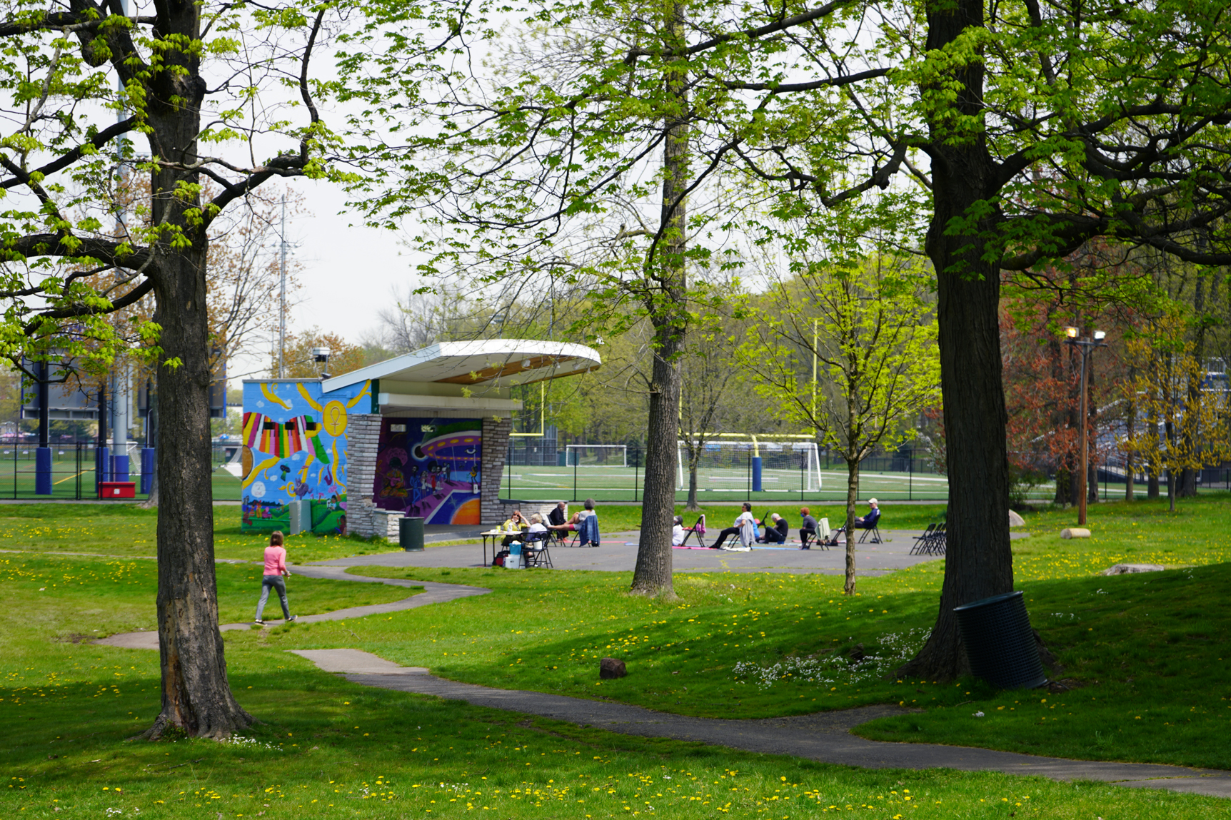 People gather at a local park in Teaneck, New Jersey