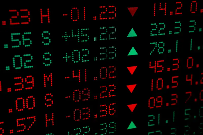 Close-up of Stock Market price numbers in red and green