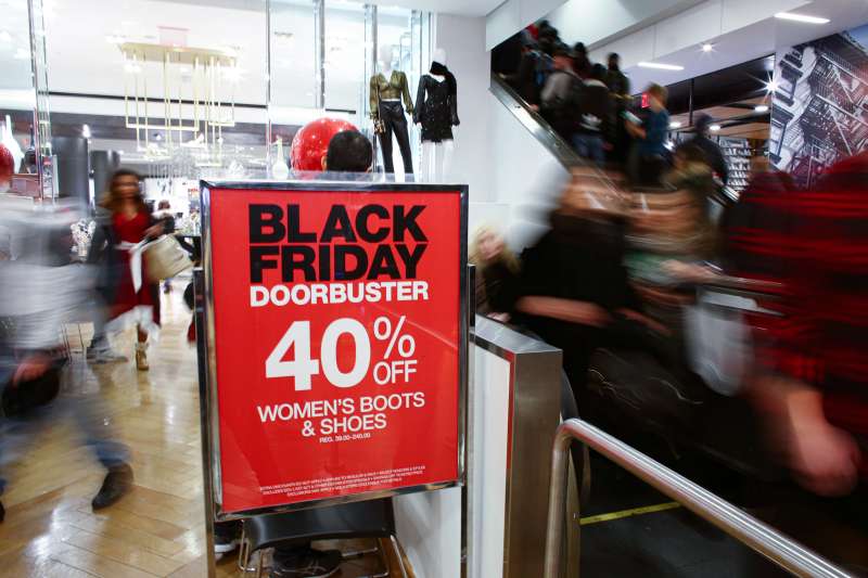 Customers shopping at the Macy's store on Black Friday Sales