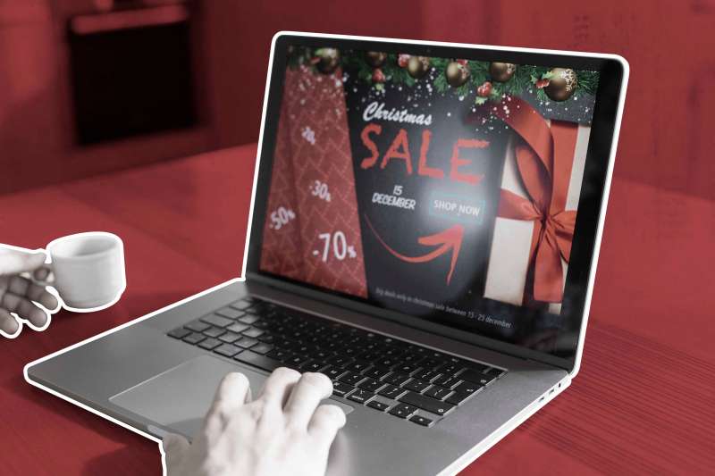 Laptop With Christmas Sale On Screen