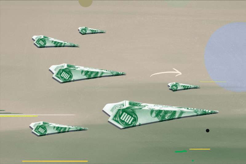 Flying paper planes with dollar banknotes
