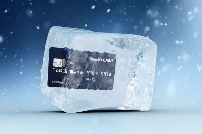 Credit Card frozen inside an ice cube