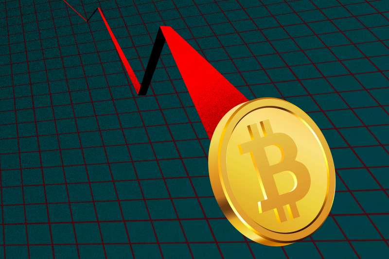 Illustration of a Bitcoin coin crashing down a graph