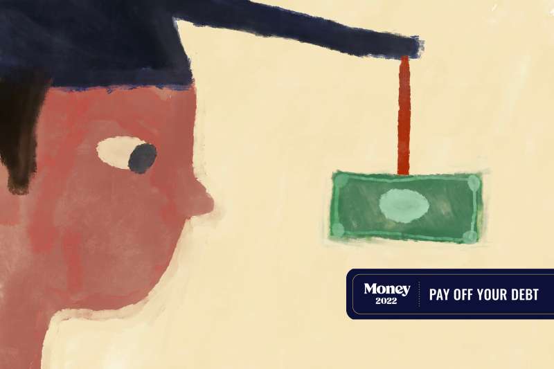A person is looking at money tassel that's coming off from the graduation cap.