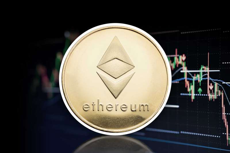 Ethereum Coin In Front Of Stock MArket Graphics