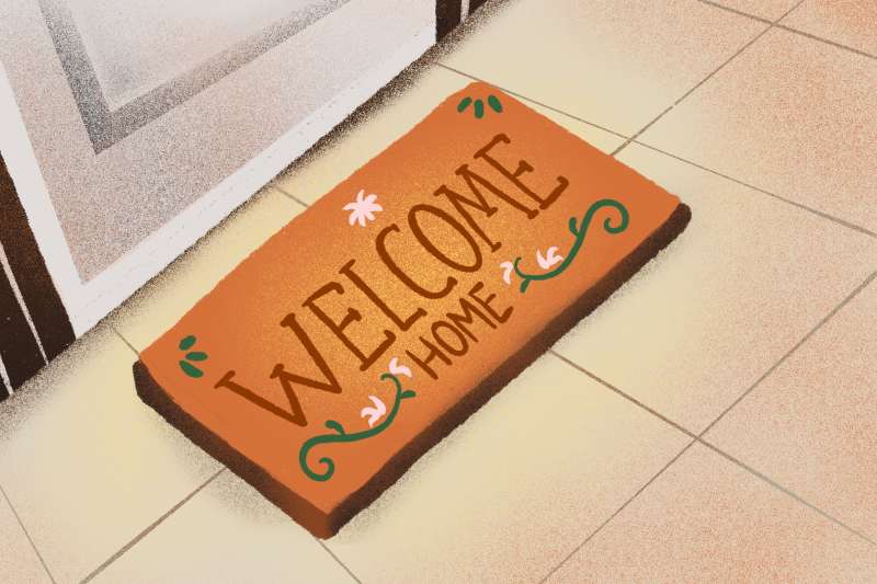 Illustration of a welcome mat in front of a home
