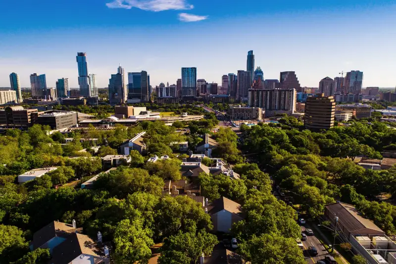 Austin Texas aerial view with green landscape with the entire skyline wide view from in the middle of south side looking north