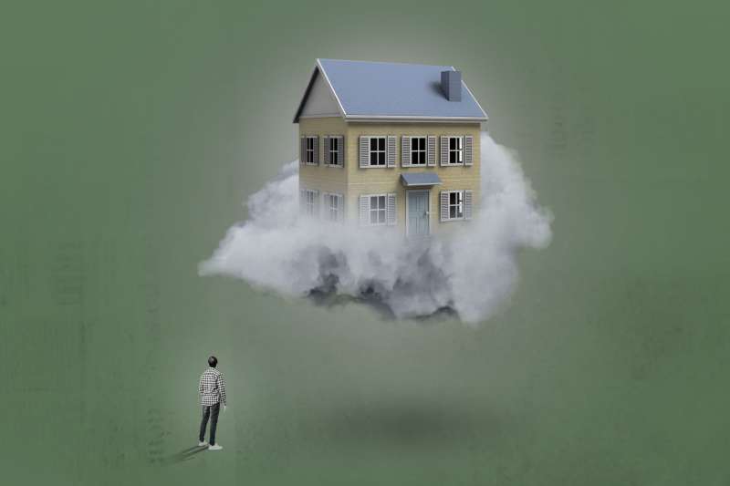 Man Looking Up To The Sky With A Large House Inside Of A Cloud