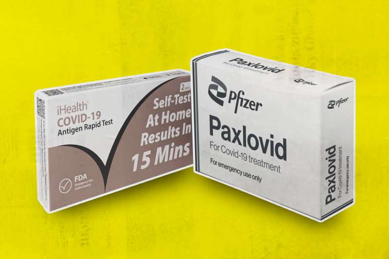 Covid Rapid Test Package Next To Pfizer Paxlovid Package
