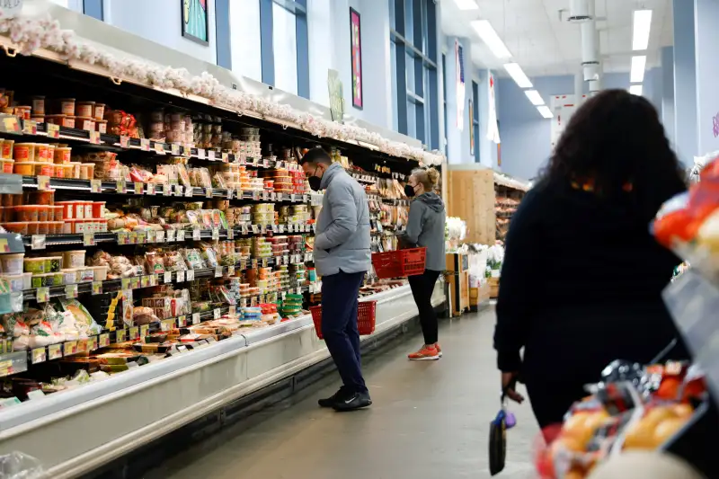 Consumers shop at a grocery store in Washington, D.C.