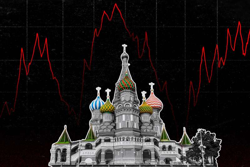 A stock graph looms over St Basils Cathedral in Russia