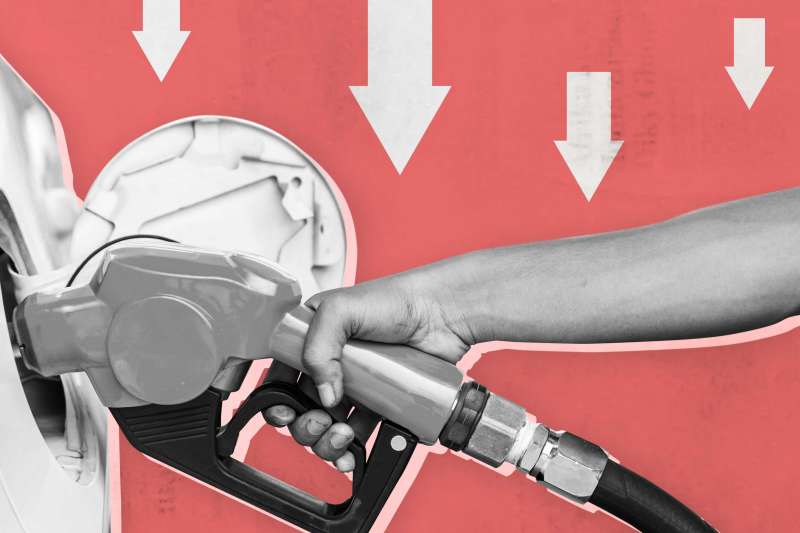 Hand Pumping Gas With Downward Arrows In Background