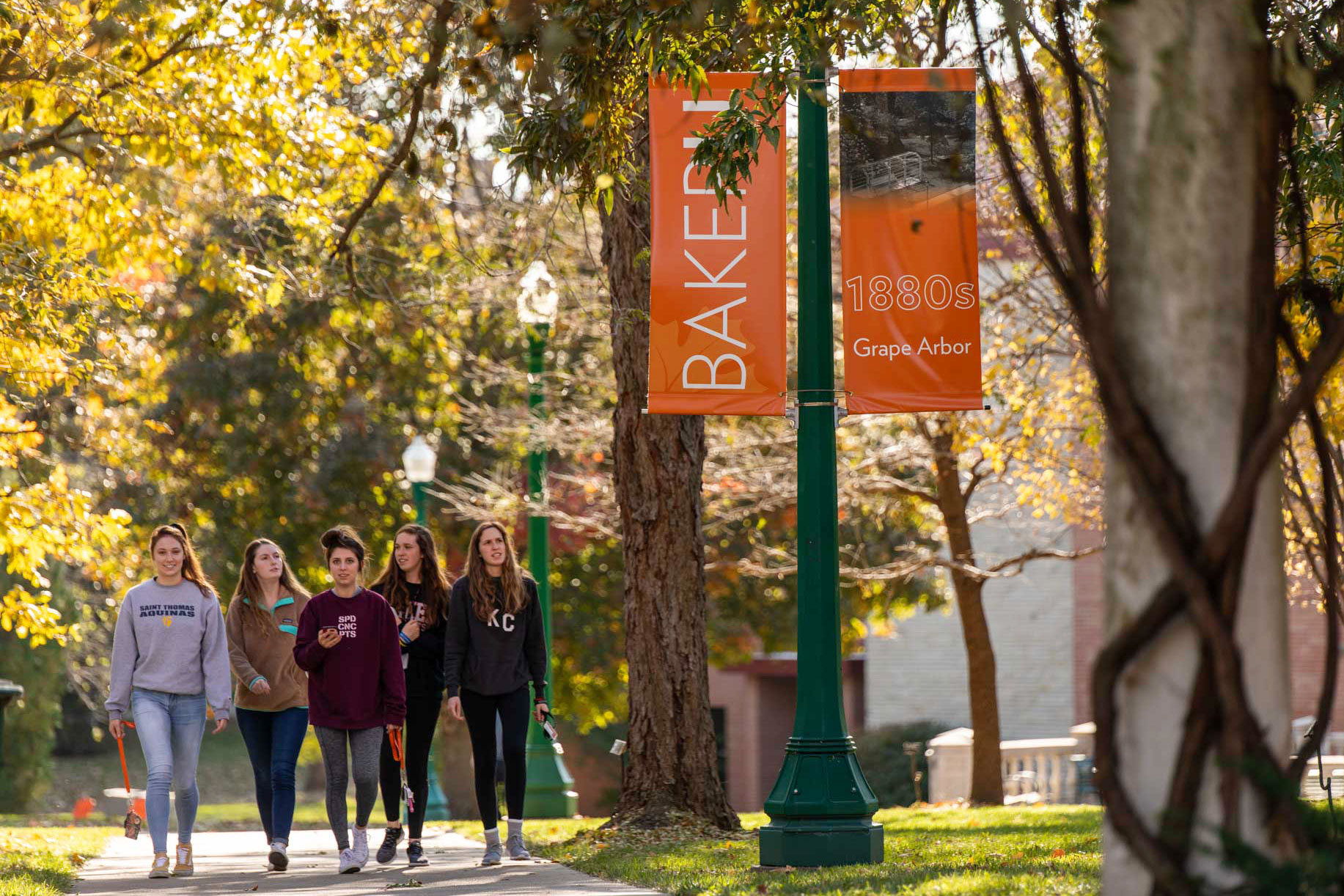Group of students walking at Baker University campus