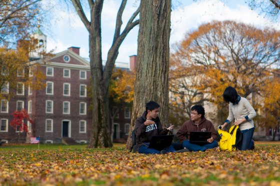 Students on the Quiet Green in autumn