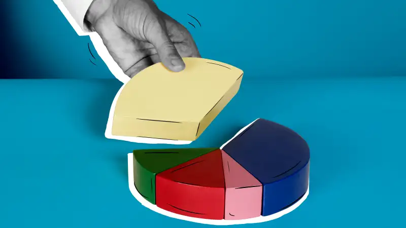 Hand taking a piece out of a block pie chart