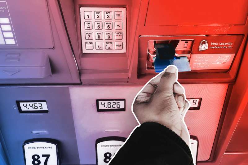 Hand Inserting Credit Card In Gas Pump